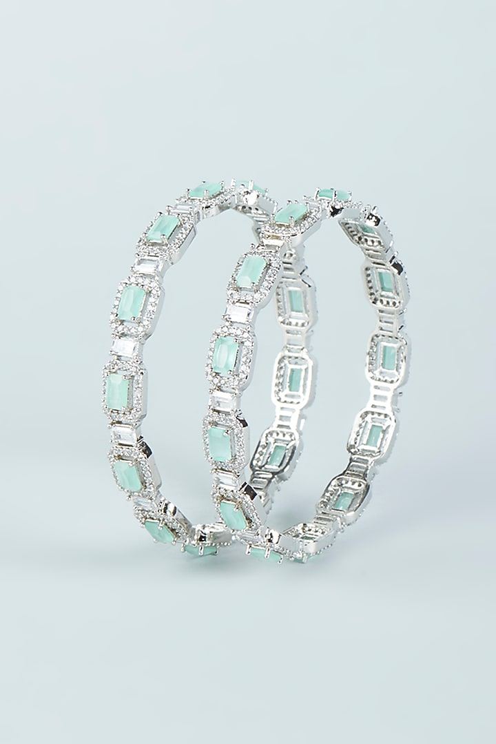 White Finish Aqua Synthetic Stone & Zircon Bangles (Set of 2) by Aster at Pernia's Pop Up Shop